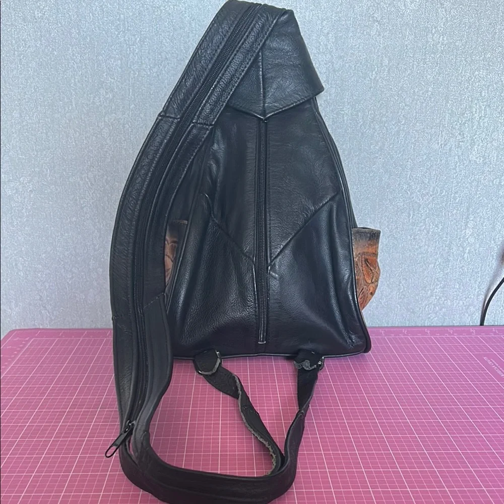 Stylish Black and Brown Backpack with Leather Accents